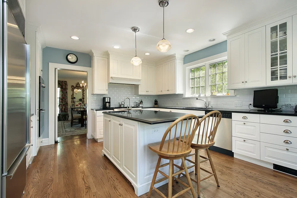 Blue kitchen walls and white cabinet painting project in Darien CT