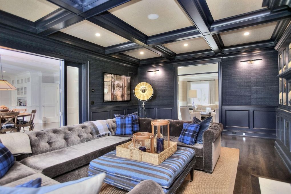 Interior house painting project in New Canaan CT with dark paneled walls and coffered ceiling