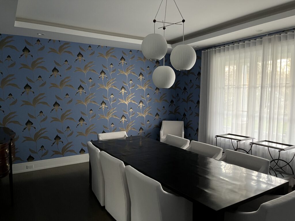 Wallpaper installation project in Westport CT with bold blue dining room accent wall